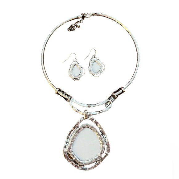 Silver in color necklace with earring set. Lightweight. Adjustable length chain. - Picture 2 of 3